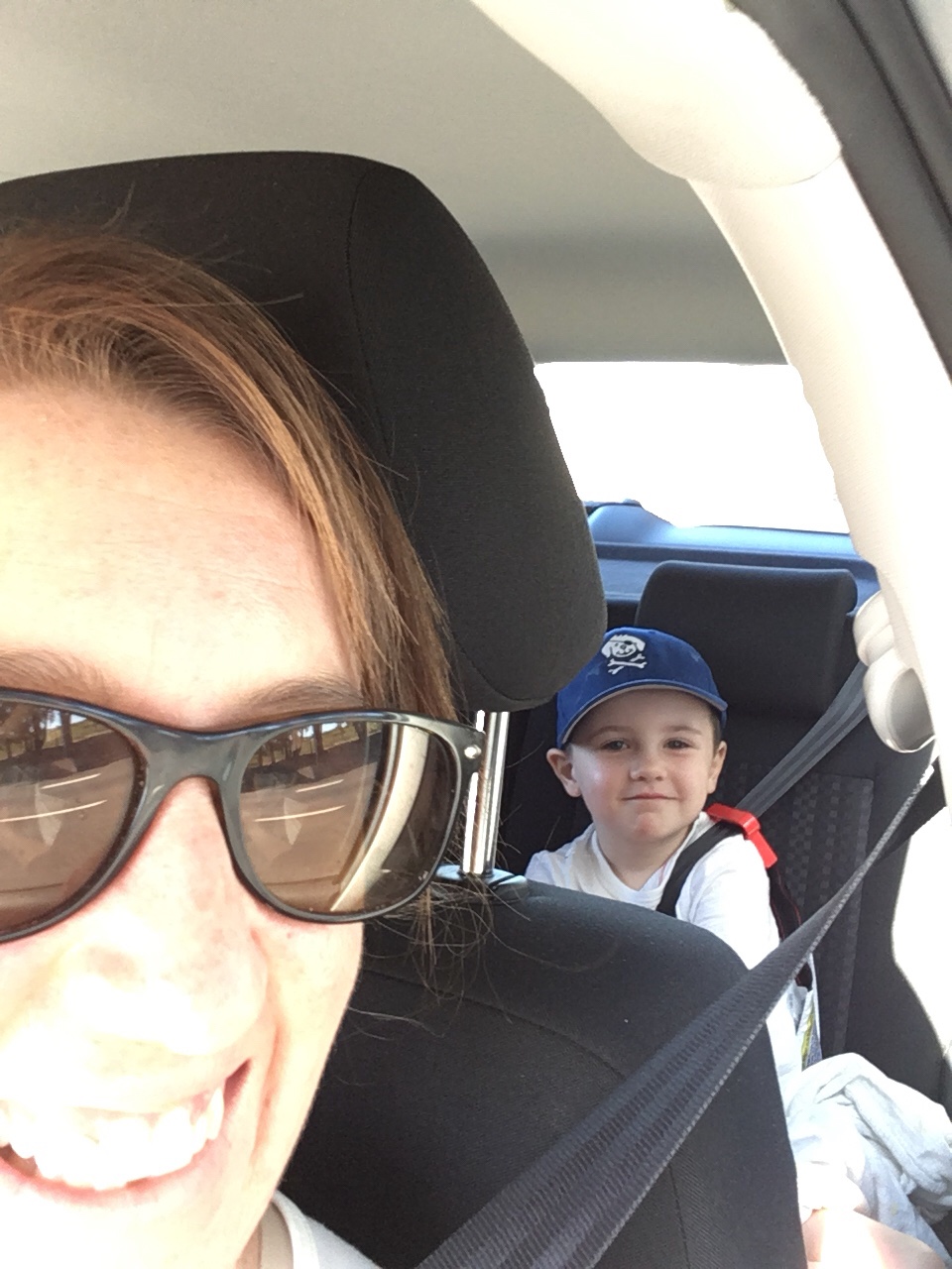 If you ever need a big brother this is the one you want. This boy takes care of both of his sisters in the backseat without us asking. He makes sure they get their food, water and blankies. He entertains Nora and always makes sure everyone is quiet when she falls asleep.